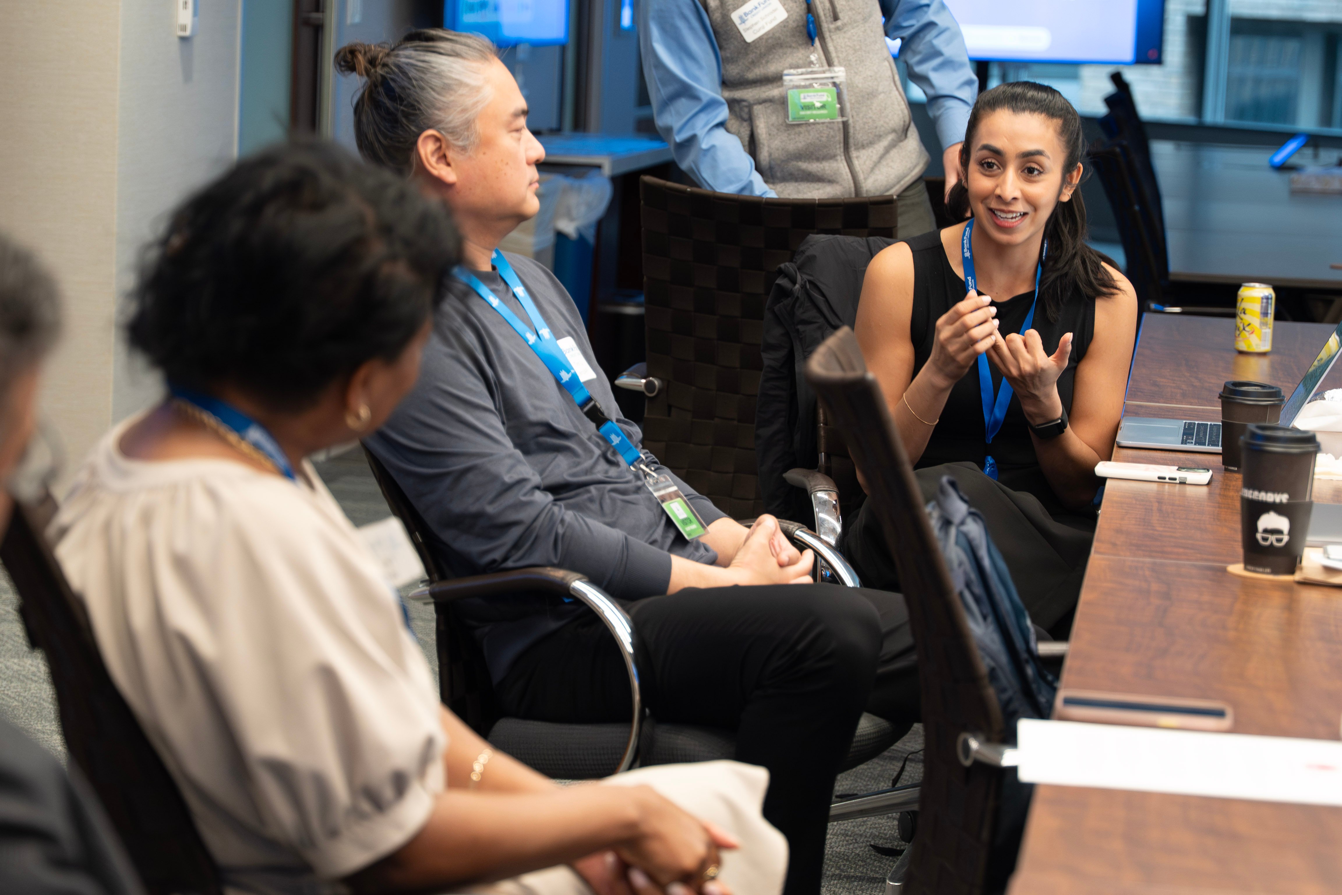 A Curql Accelerate fintech founder in discussion with a credit union executive during an on-site week